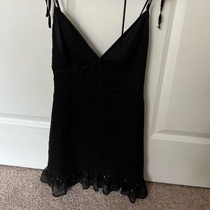 Simple black dress with star detailing